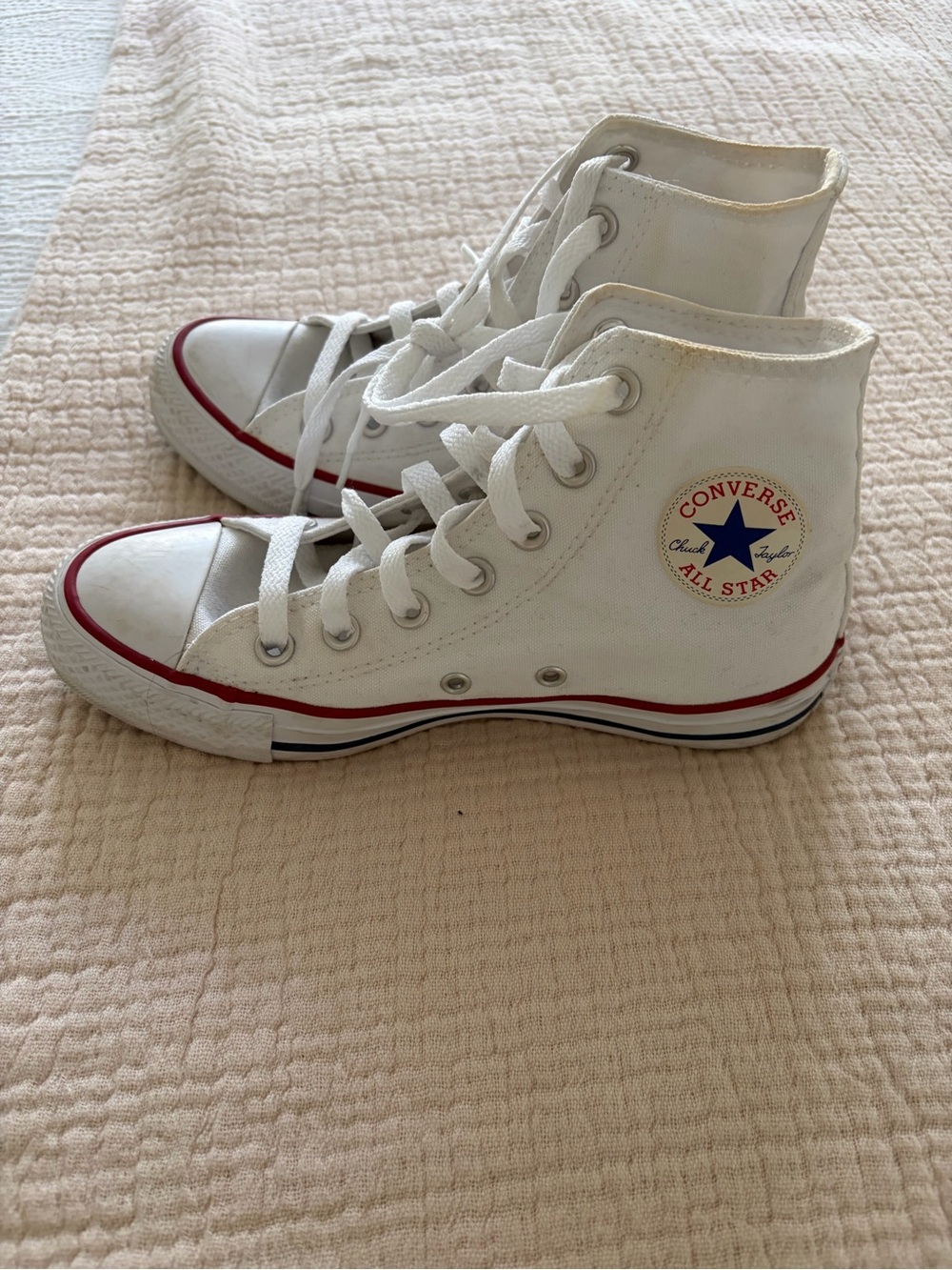 Converse White High Top Sneakers with Red Trim and Blue Star